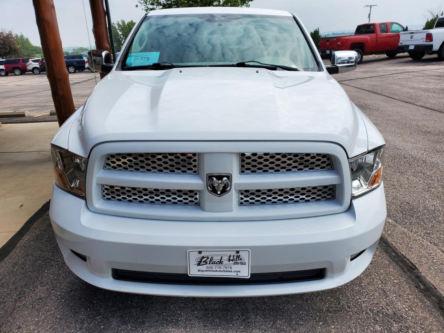 2012 White Ram 1500 Express (1C6RD6FT3CS) with an 5.7L V8 HEMI Multi-Displacement VVT engine, 6-Speed Automatic transmission, located at 1600 E Hwy 44, Rapid City, SD, 57703, (605) 716-7878, 44.070232, -103.171410 - Photo#1