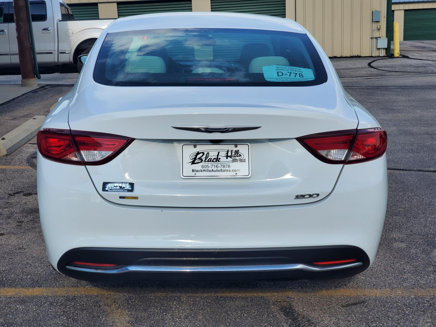 2016 White /Beige Chrysler 200 Limited (1C3CCCAB0GN) with an 2.4L 4 Cyl Multiair engine, 9-Speed Automatic transmission, located at 1600 E Hwy 44, Rapid City, SD, 57703, (605) 716-7878, 44.070232, -103.171410 - Photo#5