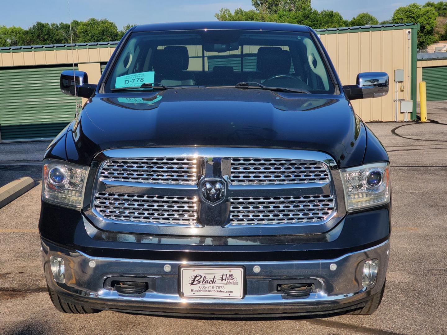 2016 Black /Black Ram 1500 Laramie (1C6RR7NT3GS) with an 5.7L V-8 Hemi engine, 8-Speed Automatic transmission, located at 1600 E Hwy 44, Rapid City, SD, 57703, (605) 716-7878, 44.070232, -103.171410 - Photo#1