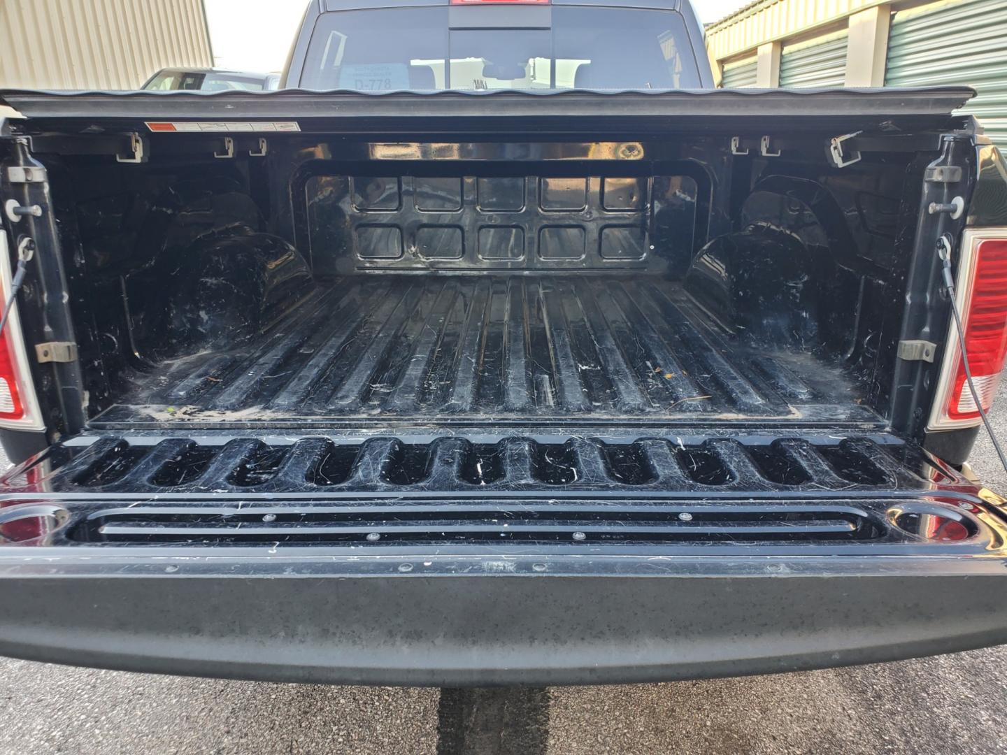 2016 Black /Black Ram 1500 Laramie (1C6RR7NT3GS) with an 5.7L V-8 Hemi engine, 8-Speed Automatic transmission, located at 1600 E Hwy 44, Rapid City, SD, 57703, (605) 716-7878, 44.070232, -103.171410 - Photo#34