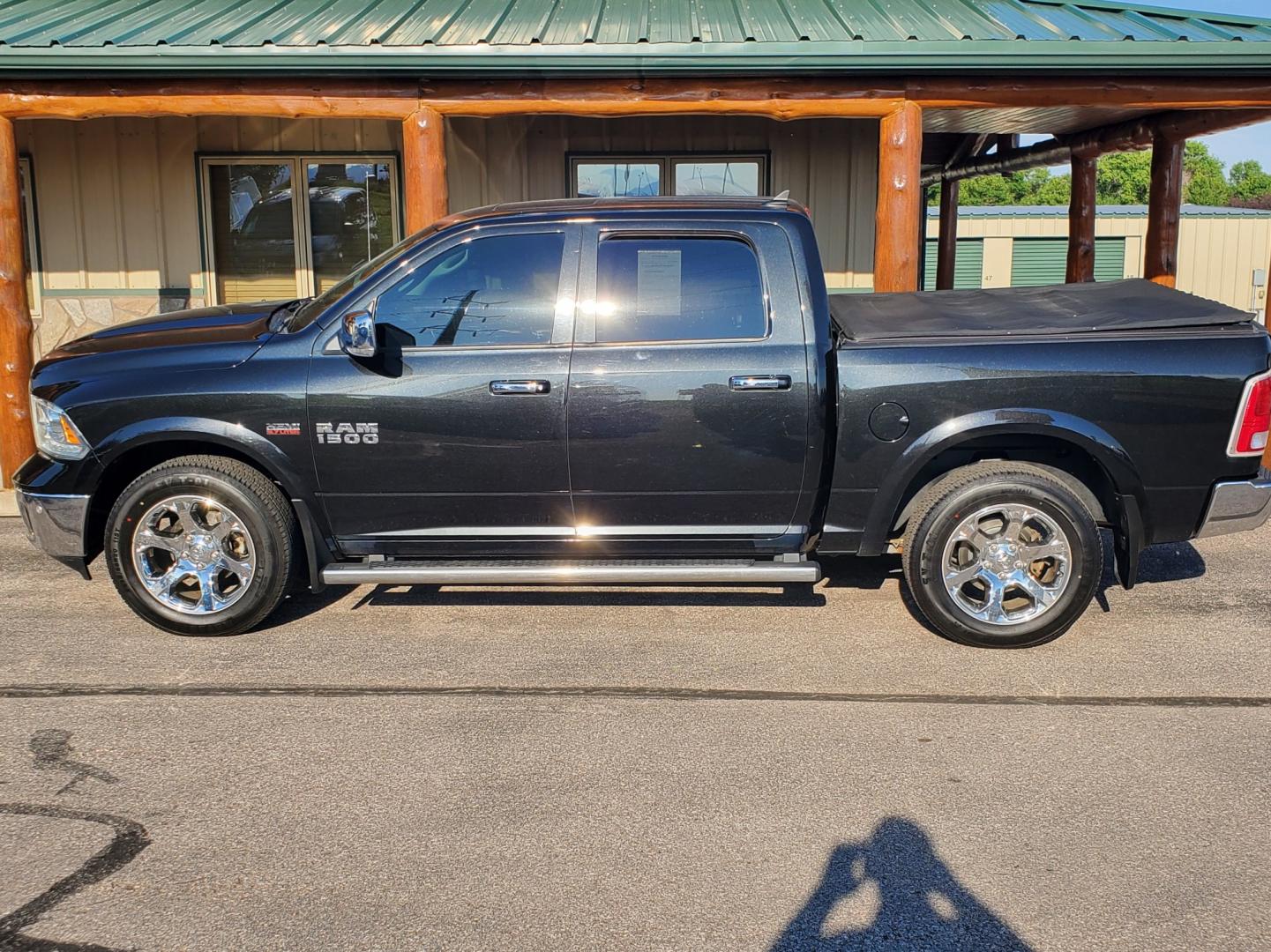 2016 Black /Black Ram 1500 Laramie (1C6RR7NT3GS) with an 5.7L V-8 Hemi engine, 8-Speed Automatic transmission, located at 1600 E Hwy 44, Rapid City, SD, 57703, (605) 716-7878, 44.070232, -103.171410 - Photo#3