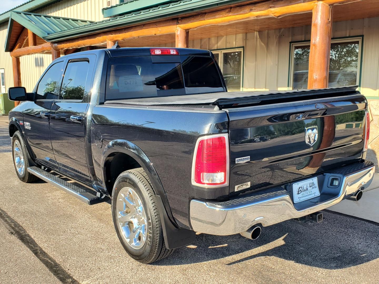 2016 Black /Black Ram 1500 Laramie (1C6RR7NT3GS) with an 5.7L V-8 Hemi engine, 8-Speed Automatic transmission, located at 1600 E Hwy 44, Rapid City, SD, 57703, (605) 716-7878, 44.070232, -103.171410 - Photo#5