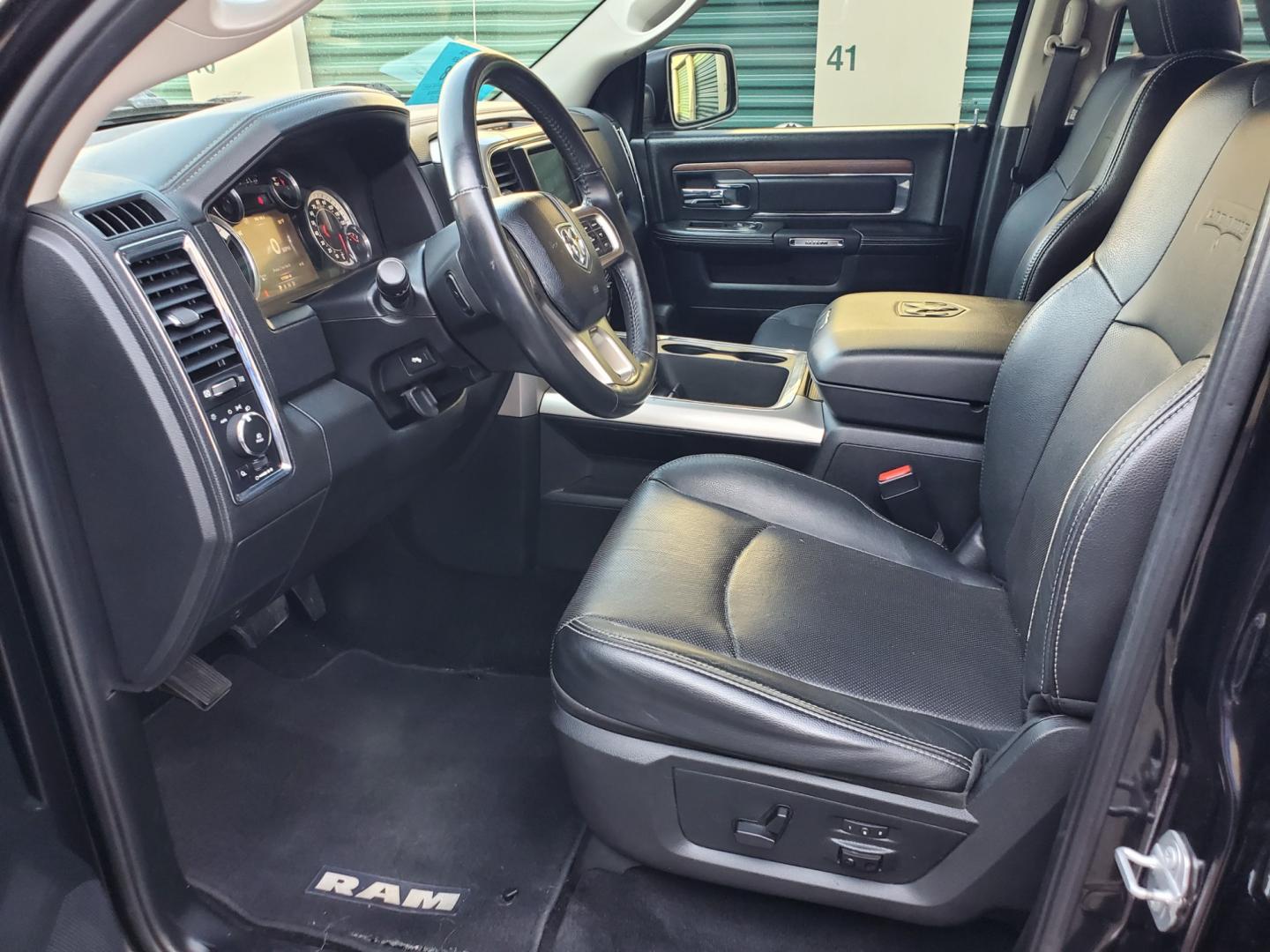 2016 Black /Black Ram 1500 Laramie (1C6RR7NT3GS) with an 5.7L V-8 Hemi engine, 8-Speed Automatic transmission, located at 1600 E Hwy 44, Rapid City, SD, 57703, (605) 716-7878, 44.070232, -103.171410 - Photo#8