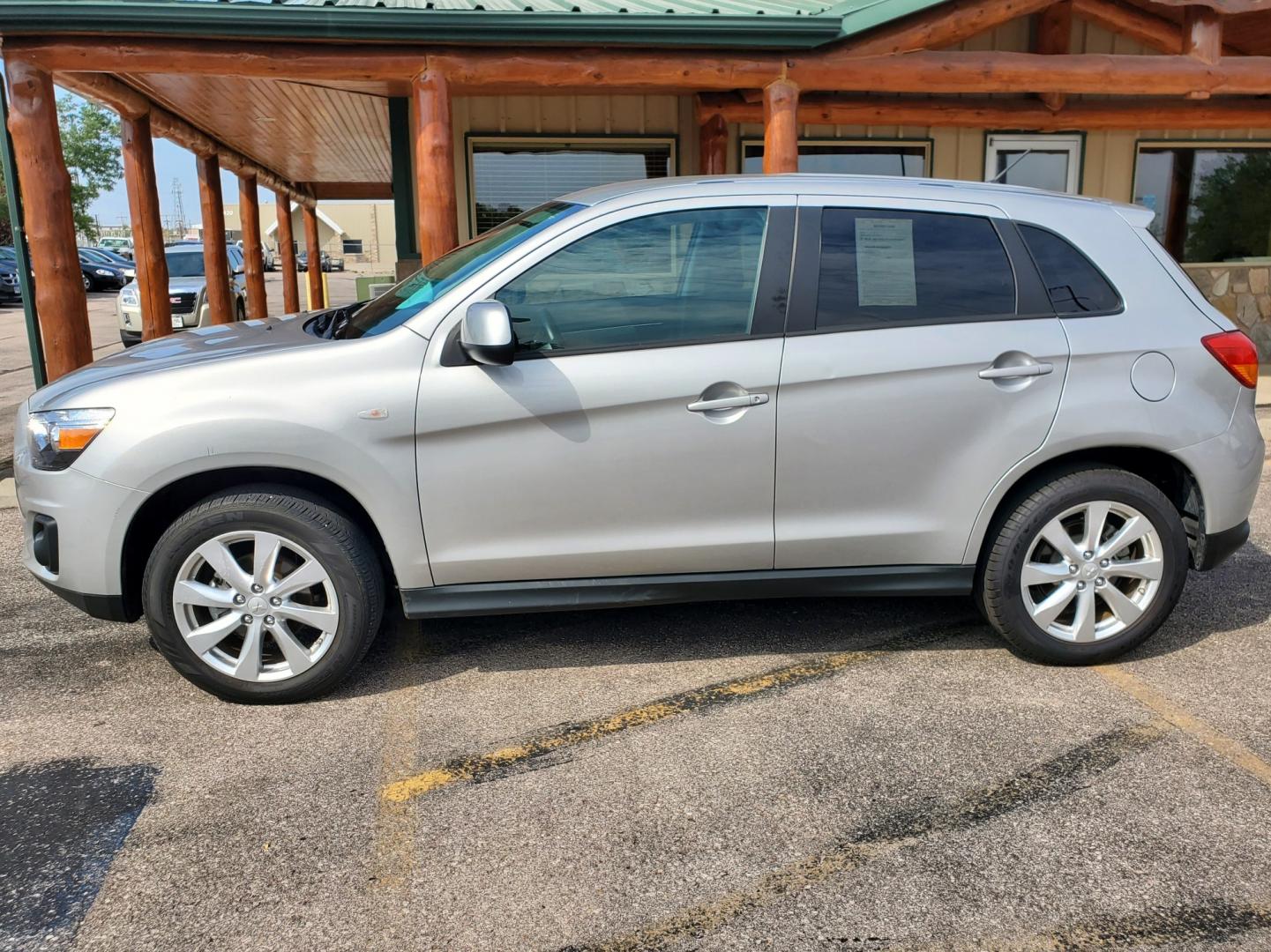 2015 Silver Mitsubishi Outlander Sport ES (4A4AR3AU4FE) with an 2.0l 4 Cyl engine, 6-Speed CVT w/ Overdrive transmission, located at 1600 E Hwy 44, Rapid City, SD, 57703, (605) 716-7878, 44.070232, -103.171410 - Photo#3