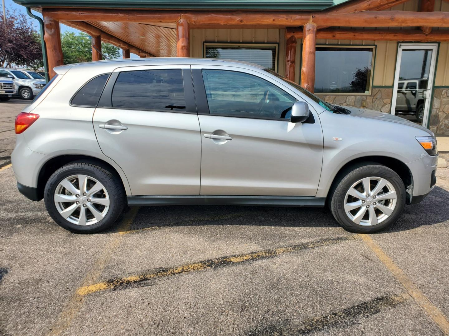 2015 Silver Mitsubishi Outlander Sport ES (4A4AR3AU4FE) with an 2.0l 4 Cyl engine, 6-Speed CVT w/ Overdrive transmission, located at 1600 E Hwy 44, Rapid City, SD, 57703, (605) 716-7878, 44.070232, -103.171410 - Photo#4