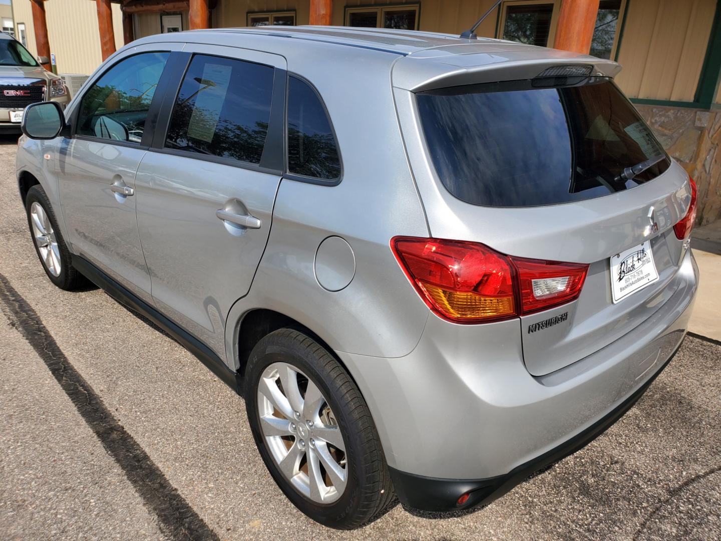 2015 Silver Mitsubishi Outlander Sport ES (4A4AR3AU4FE) with an 2.0l 4 Cyl engine, 6-Speed CVT w/ Overdrive transmission, located at 1600 E Hwy 44, Rapid City, SD, 57703, (605) 716-7878, 44.070232, -103.171410 - Photo#5