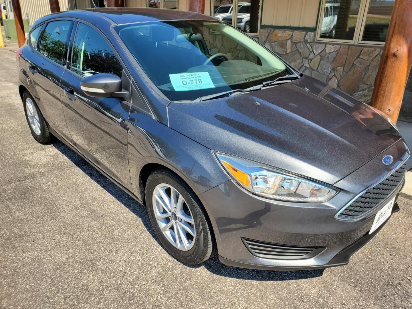 2017 Gray /Gray Ford Focus SE (1FADP3K29HL) with an 2.0L 4Cyl GDI TI-VCT engine, 6-Speed Powershift Automatic transmission, located at 1600 E Hwy 44, Rapid City, SD, 57703, (605) 716-7878, 44.070232, -103.171410 - Photo#0