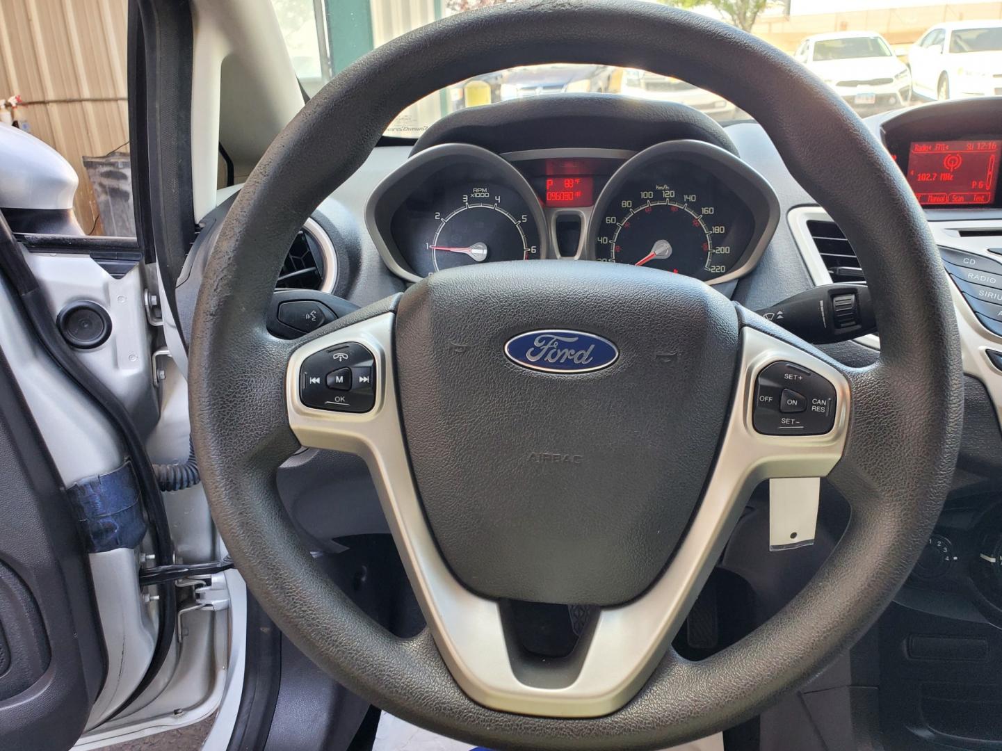 2012 Silver /Black Ford Fiesta SE (3FADP4EJ5CM) with an 1.6l 4Cyl TI-VCT engine, 6-Speed Poweshift transmission, located at 1600 E Hwy 44, Rapid City, SD, 57703, (605) 716-7878, 44.070232, -103.171410 - Photo#14