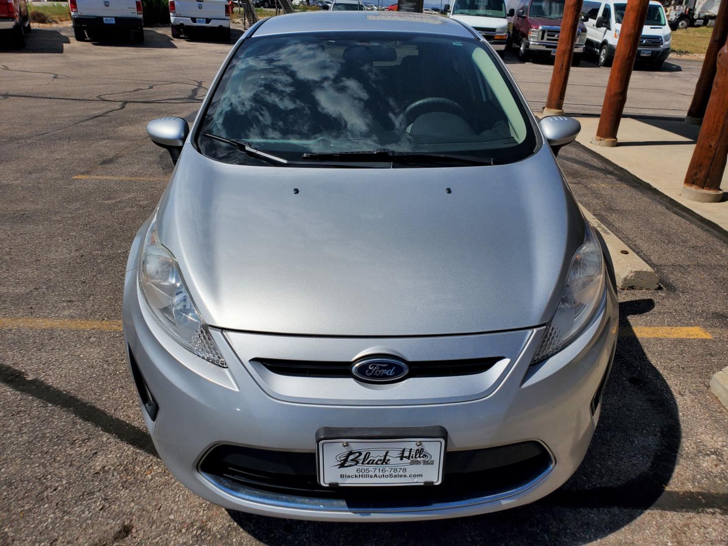 2012 Silver /Black Ford Fiesta SE (3FADP4EJ5CM) with an 1.6l 4Cyl TI-VCT engine, 6-Speed Poweshift transmission, located at 1600 E Hwy 44, Rapid City, SD, 57703, (605) 716-7878, 44.070232, -103.171410 - Photo#1