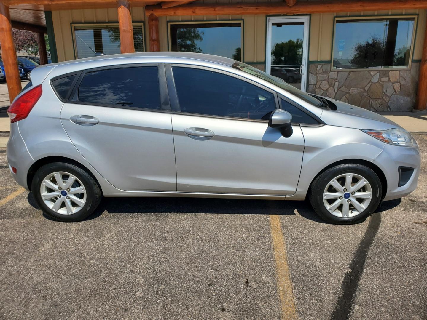 2012 Silver /Black Ford Fiesta SE (3FADP4EJ5CM) with an 1.6l 4Cyl TI-VCT engine, 6-Speed Poweshift transmission, located at 1600 E Hwy 44, Rapid City, SD, 57703, (605) 716-7878, 44.070232, -103.171410 - Photo#3