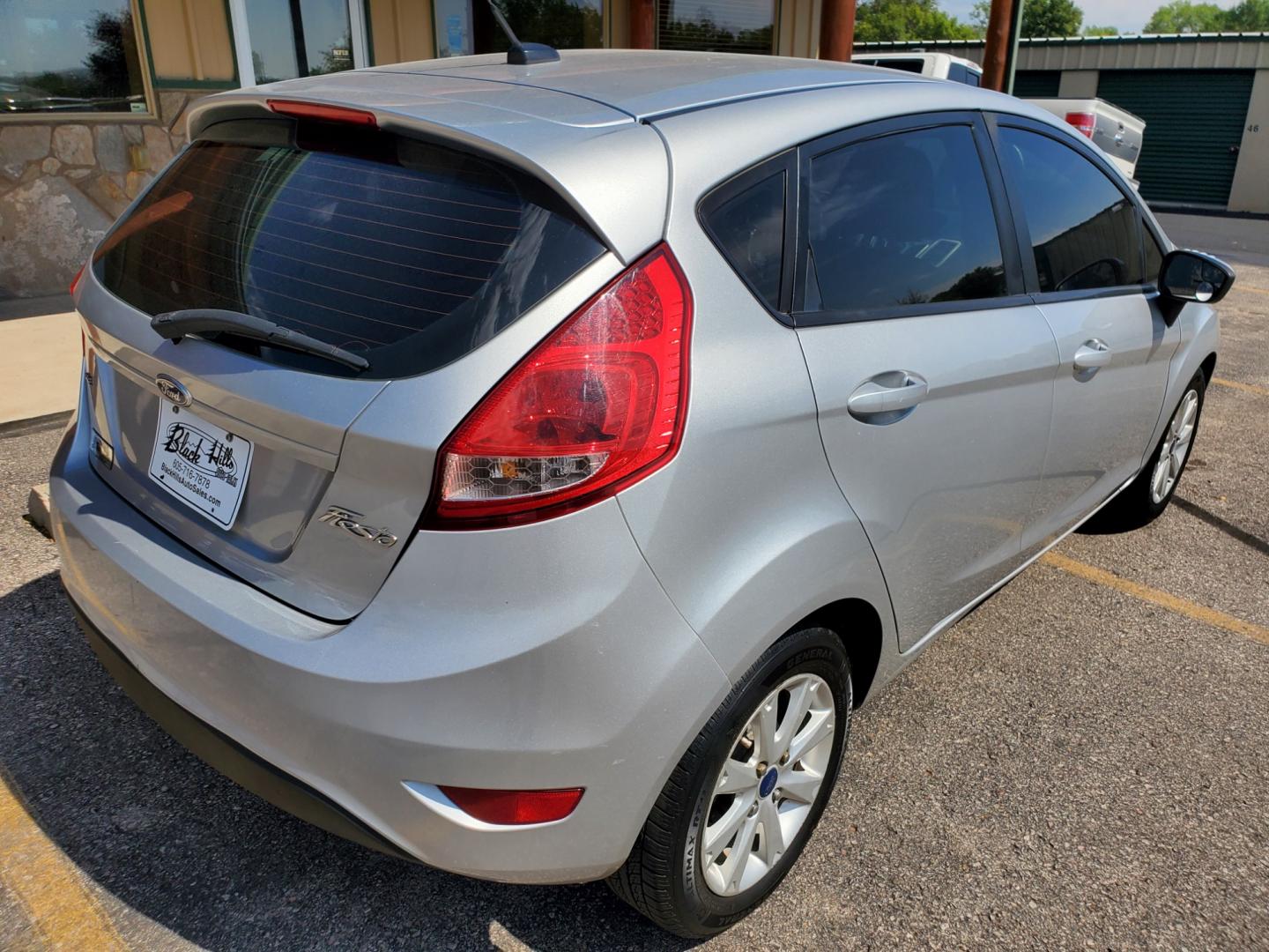 2012 Silver /Black Ford Fiesta SE (3FADP4EJ5CM) with an 1.6l 4Cyl TI-VCT engine, 6-Speed Poweshift transmission, located at 1600 E Hwy 44, Rapid City, SD, 57703, (605) 716-7878, 44.070232, -103.171410 - Photo#7