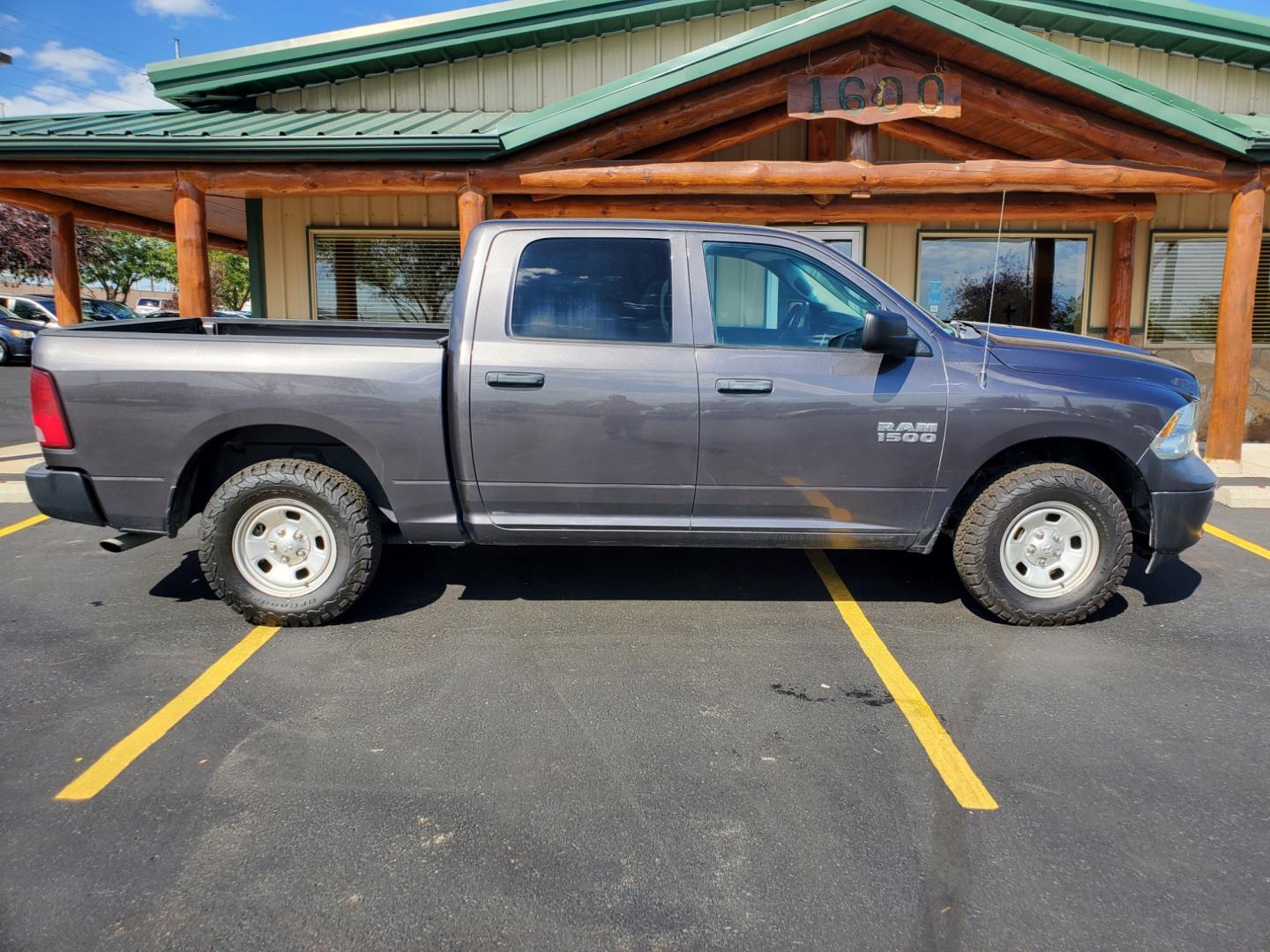 2015 Dk Gray Ram 1500 Tradesman (1C6RR7KG4FS) with an 3.6L V-6 engine, 8-Speed Automatic transmission, located at 1600 E Hwy 44, Rapid City, SD, 57703, (605) 716-7878, 44.070232, -103.171410 - Photo#4