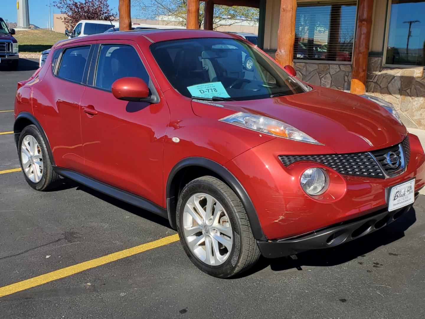 2013 Maroon Nissan Juke SL (JN8AF5MV1DT) with an 1.6L 4 Cyl Turbocharged engine, 1-Speed CVT transmission, located at 1600 E Hwy 44, Rapid City, SD, 57703, (605) 716-7878, 44.070232, -103.171410 - Photo#0