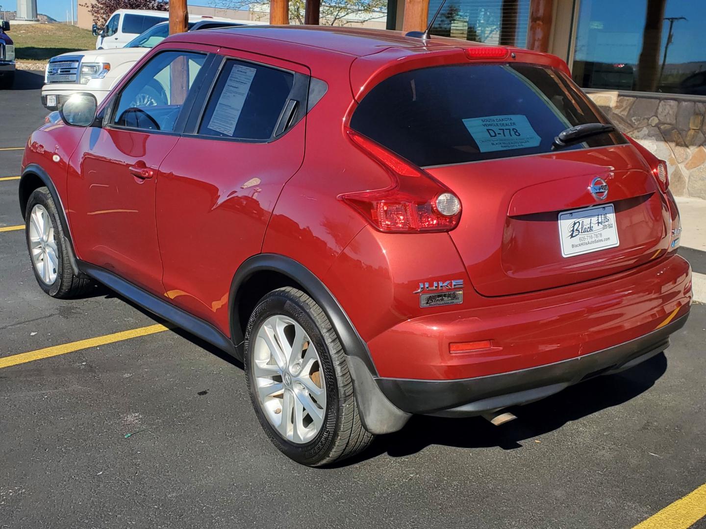 2013 Maroon Nissan Juke SL (JN8AF5MV1DT) with an 1.6L 4 Cyl Turbocharged engine, 1-Speed CVT transmission, located at 1600 E Hwy 44, Rapid City, SD, 57703, (605) 716-7878, 44.070232, -103.171410 - Photo#5