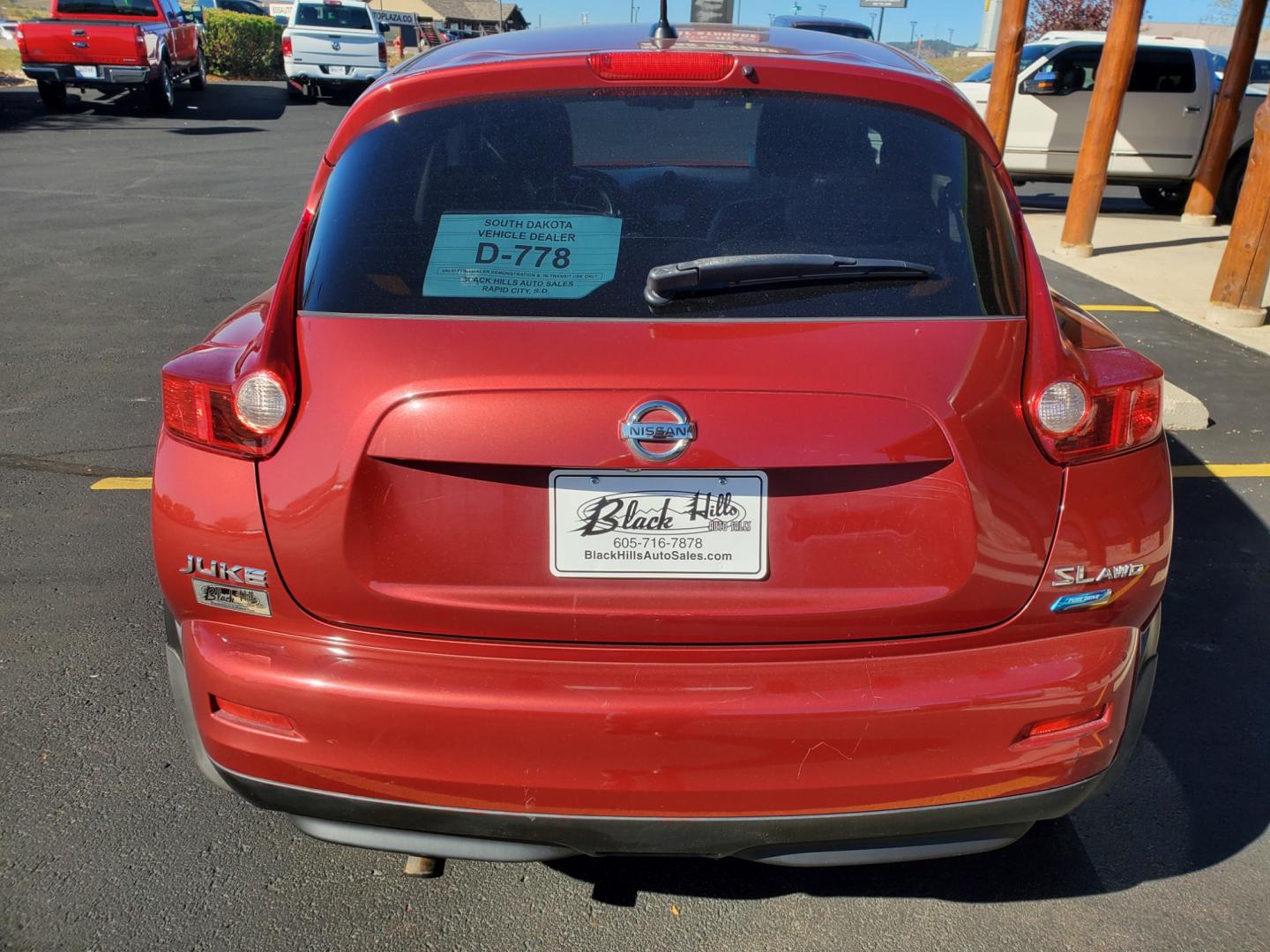 2013 Maroon Nissan Juke SL (JN8AF5MV1DT) with an 1.6L 4 Cyl Turbocharged engine, 1-Speed CVT transmission, located at 1600 E Hwy 44, Rapid City, SD, 57703, (605) 716-7878, 44.070232, -103.171410 - Photo#6