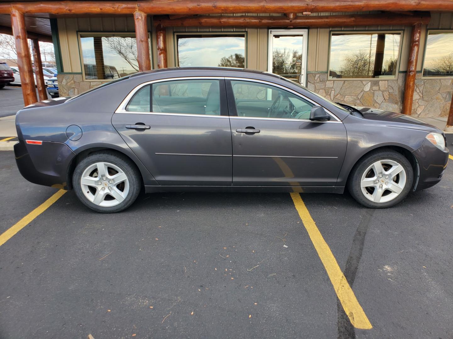 2012 Gray /Lt Gray Chevrolet Malibu LS (1G1ZA5EU9CF) with an 2.4L 4 Cyl Ecotec DOHC 16, Valve Variable Valve Timing, MFI engine, 6-Speed Automatic transmission, located at 1600 E Hwy 44, Rapid City, SD, 57703, (605) 716-7878, 44.070232, -103.171410 - Photo#4