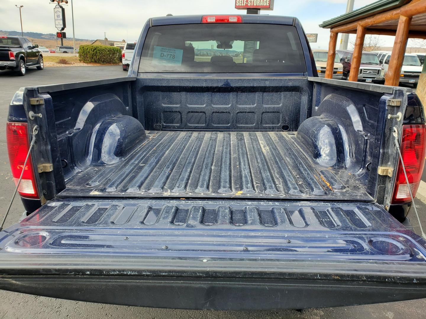 2014 Blue Ram 1500 Tradesman (1C6RR7KG3ES) with an 3.6L V-6 engine, 8-Speed Automatic transmission, located at 1600 E Hwy 44, Rapid City, SD, 57703, (605) 716-7878, 44.070232, -103.171410 - Photo#24