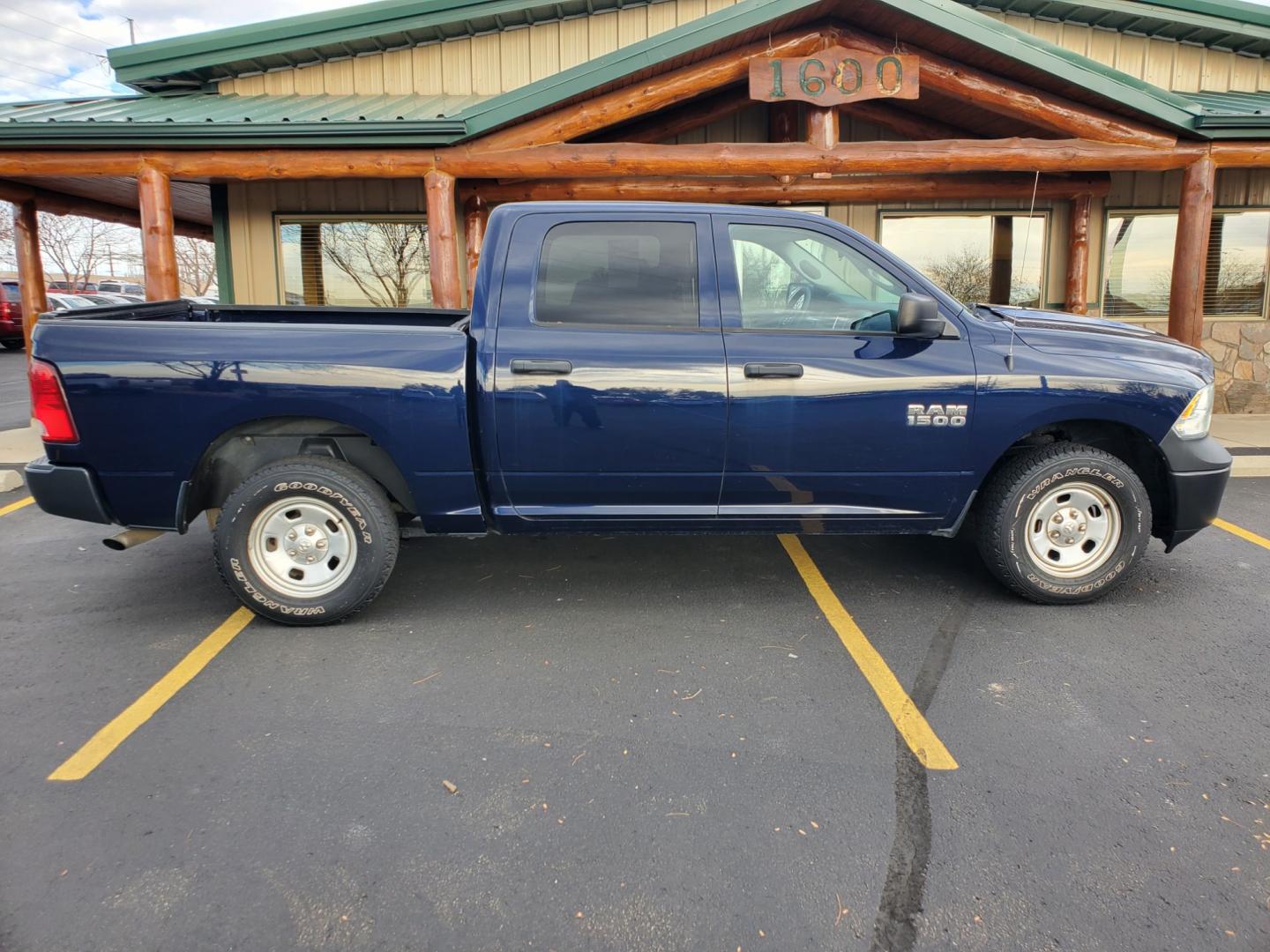 2014 Blue Ram 1500 Tradesman (1C6RR7KG3ES) with an 3.6L V-6 engine, 8-Speed Automatic transmission, located at 1600 E Hwy 44, Rapid City, SD, 57703, (605) 716-7878, 44.070232, -103.171410 - Photo#4