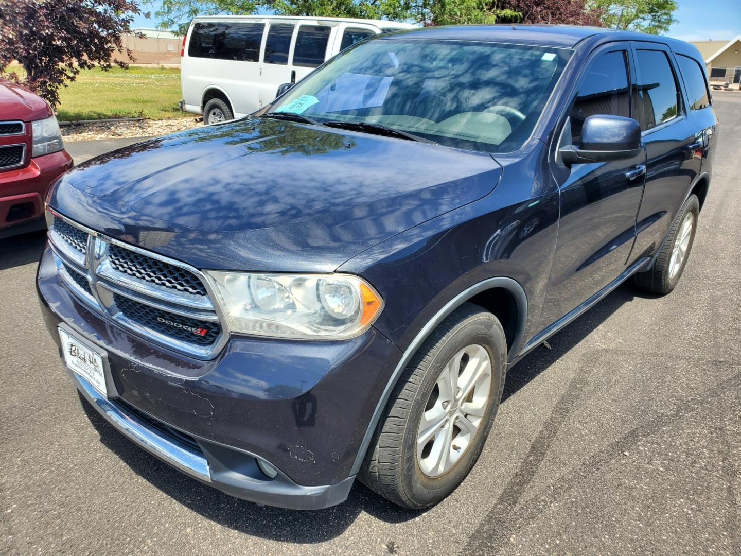 2013 Gray Dodge Durango SXT (1C4RDJAG6DC) with an 3.6L 24-Valve VVT engine, 5-Speed Automatic transmission, located at 1600 E Hwy 44, Rapid City, SD, 57703, (605) 716-7878, 44.070232, -103.171410 - Photo#2