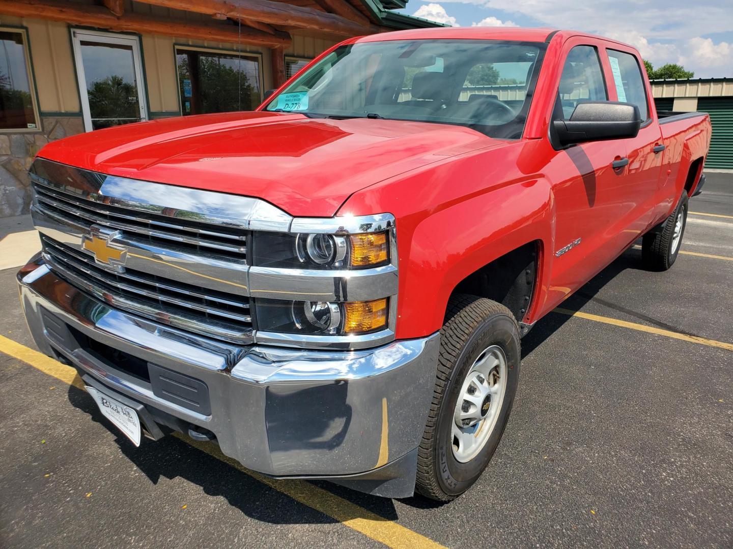 2015 Red /Gray Chevrolet Silverado 2500 HD (1GC1KUEG2FF) with an 6.0L Vortec V8 Varaible Valve Timing SFI engine, 6-Speed Automatic Heavy-Duty, Electronically Controlled transmission, located at 1600 E Hwy 44, Rapid City, SD, 57703, (605) 716-7878, 44.070232, -103.171410 - Photo#2