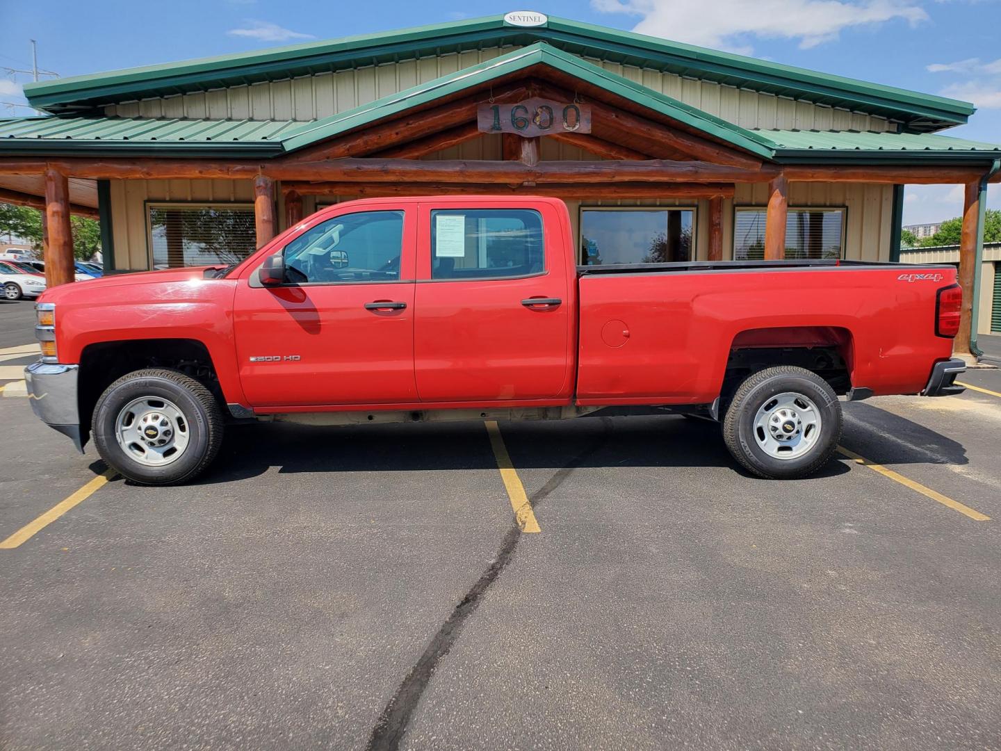 2015 Red /Gray Chevrolet Silverado 2500 HD (1GC1KUEG2FF) with an 6.0L Vortec V8 Varaible Valve Timing SFI engine, 6-Speed Automatic Heavy-Duty, Electronically Controlled transmission, located at 1600 E Hwy 44, Rapid City, SD, 57703, (605) 716-7878, 44.070232, -103.171410 - Photo#3