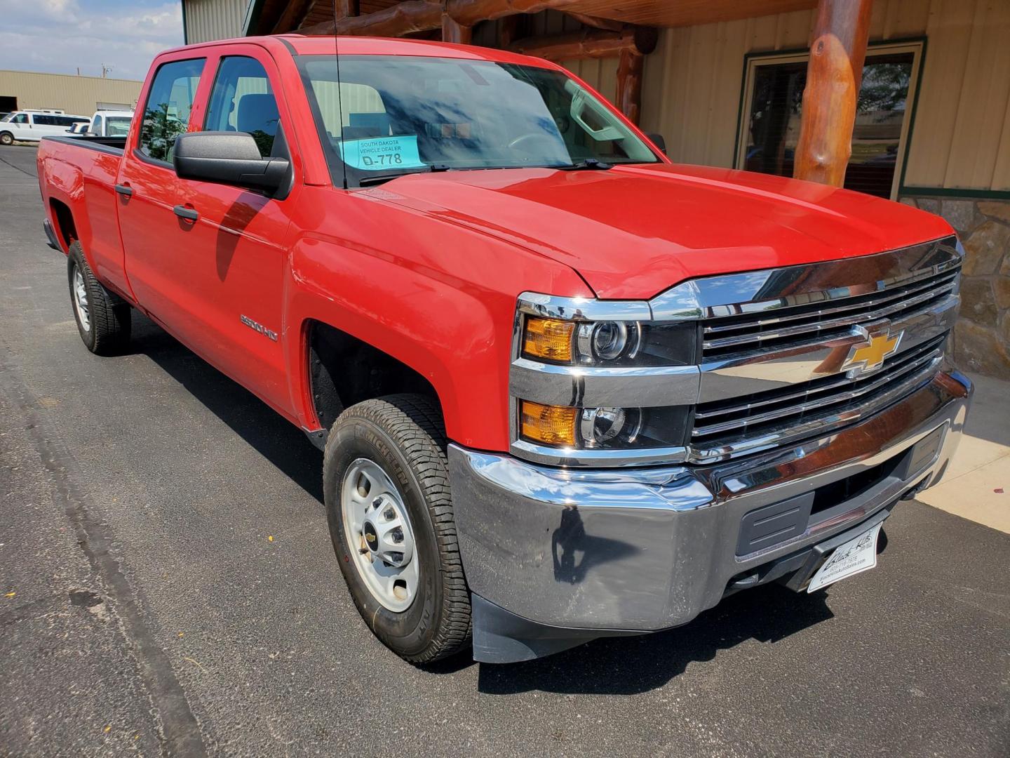 2015 Red /Gray Chevrolet Silverado 2500 HD (1GC1KUEG2FF) with an 6.0L Vortec V8 Varaible Valve Timing SFI engine, 6-Speed Automatic Heavy-Duty, Electronically Controlled transmission, located at 1600 E Hwy 44, Rapid City, SD, 57703, (605) 716-7878, 44.070232, -103.171410 - Photo#0