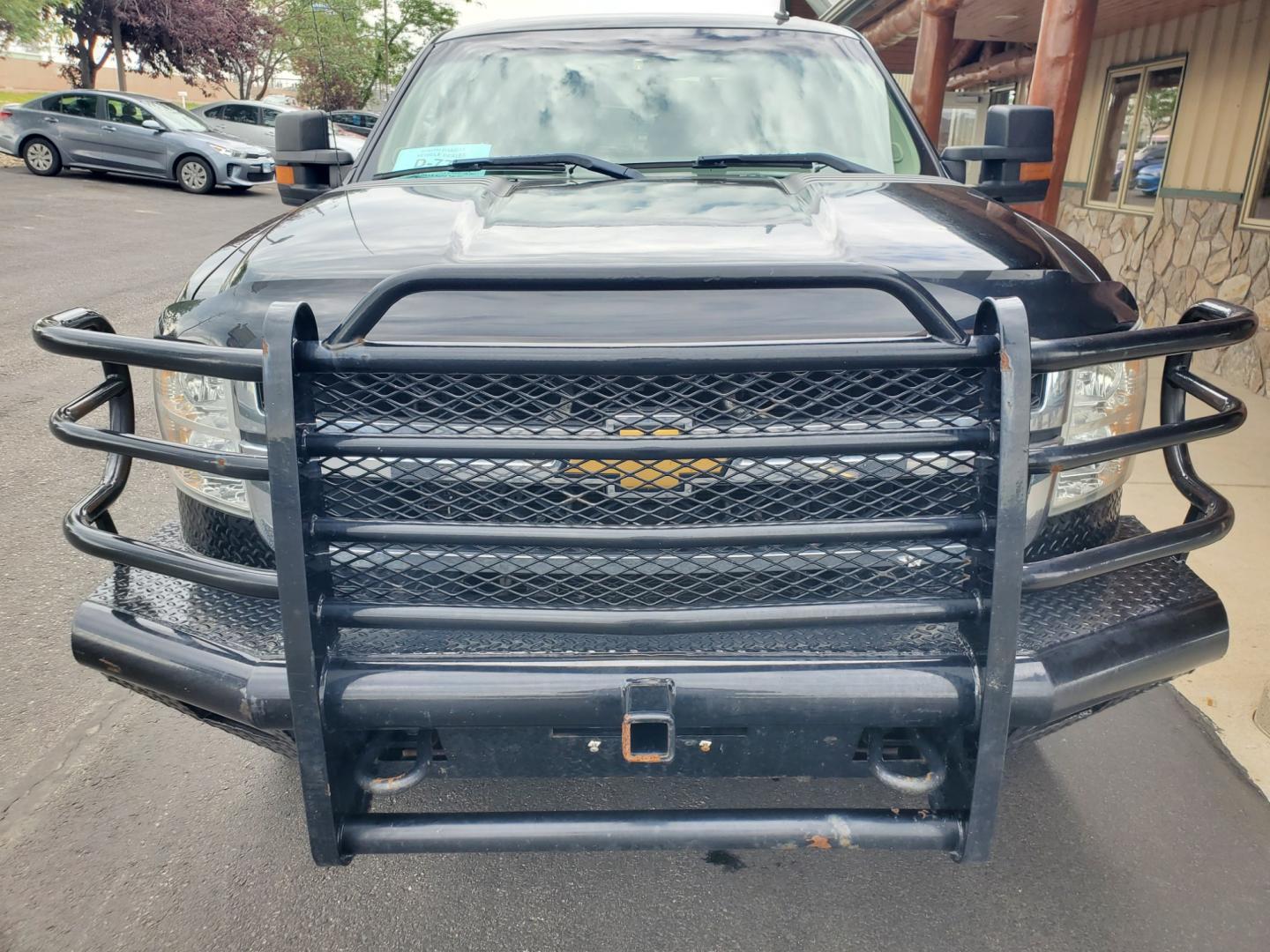 2012 Black Chevrolet Silverado 2500 HD LT (1GC1KXCG9CF) with an VORTEC 6.0L V-8 VVT SFI engine, 6-Speed Automatic, Heavy-Duty, Electronically Controlled transmission, located at 1600 E Hwy 44, Rapid City, SD, 57703, (605) 716-7878, 44.070232, -103.171410 - Photo#1