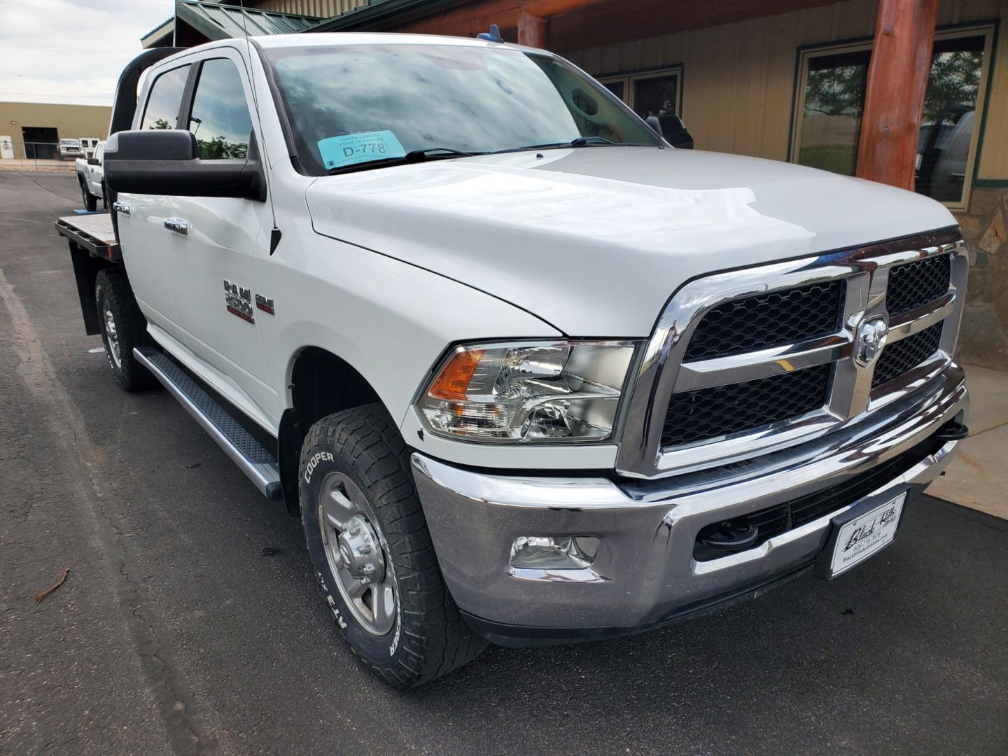 2018 White Ram 2500 HD SLT (3C6UR5DJ3JG) with an 6.4L Heavy Duty V-8 HEMI W/MDS engine, 6-Speed Automatic transmission, located at 1600 E Hwy 44, Rapid City, SD, 57703, (605) 716-7878, 44.070232, -103.171410 - Photo#0