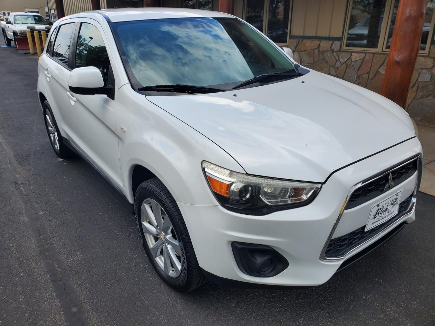 2015 White /Black Mitsubishi Outlander Sport ES (4A4AR3AU0FE) with an 2.4L 4 Cyl engine, 6 speed CVT w/OD transmission, located at 1600 E Hwy 44, Rapid City, SD, 57703, (605) 716-7878, 44.070232, -103.171410 - Photo#0