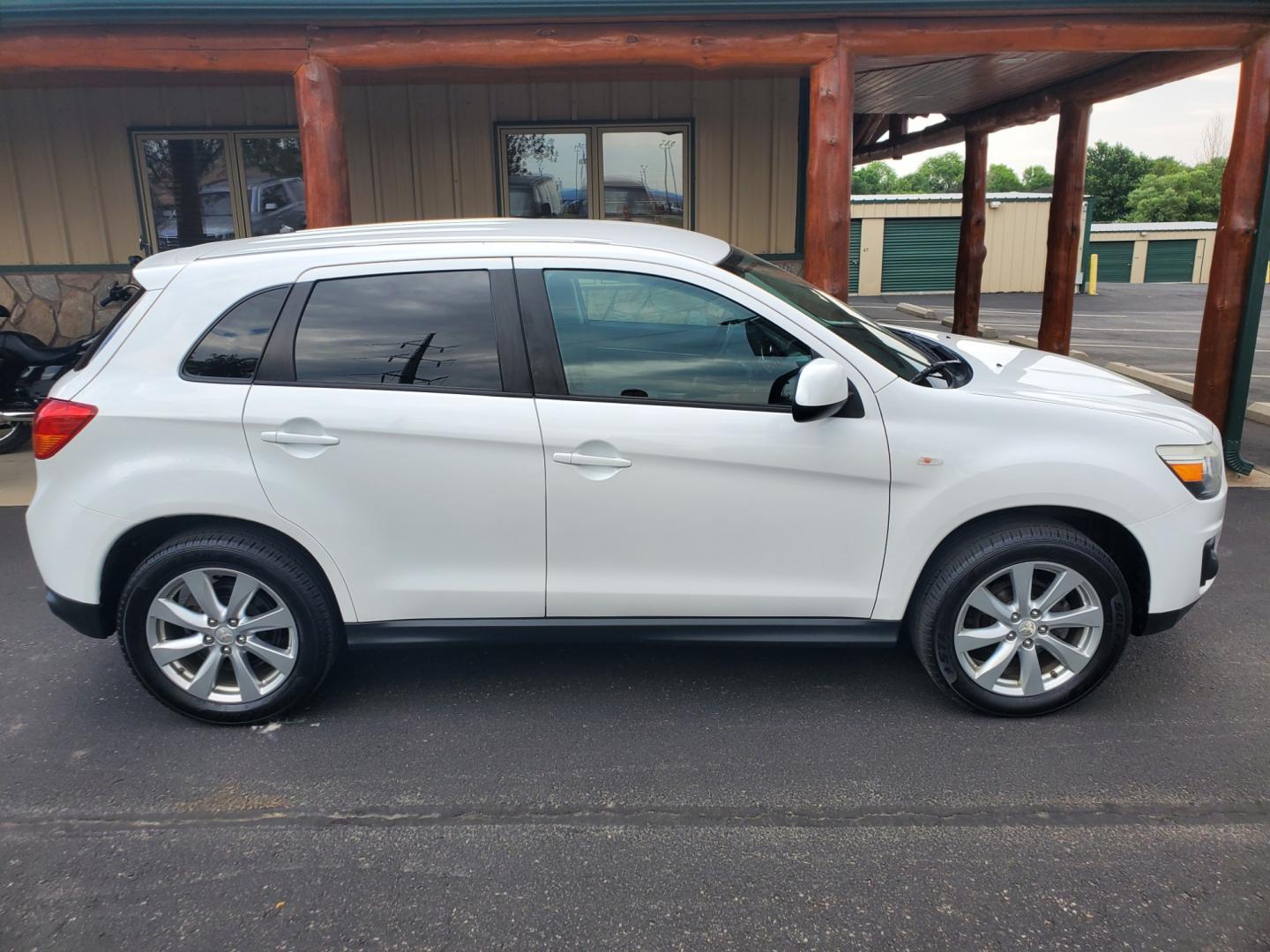 2015 White /Black Mitsubishi Outlander Sport ES (4A4AR3AU0FE) with an 2.4L 4 Cyl engine, 6 speed CVT w/OD transmission, located at 1600 E Hwy 44, Rapid City, SD, 57703, (605) 716-7878, 44.070232, -103.171410 - Photo#4