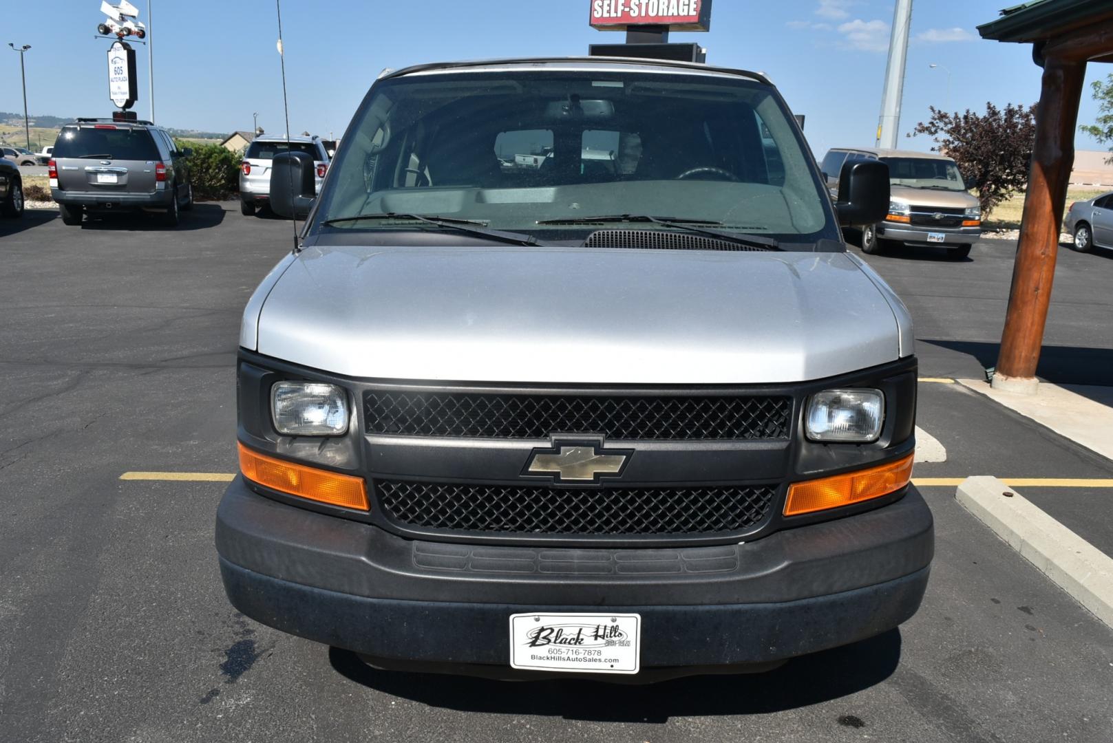 2015 Silver /Gray Chevrolet Express 2500 LS (1GAWGPFG8F1) with an 6.0L Vortec V-8 SFI engine, 6-Speed Automatic, Heavy-Duty, Electronically Controlled transmission, located at 1600 E Hwy 44, Rapid City, SD, 57703, (605) 716-7878, 44.070232, -103.171410 - Photo#1