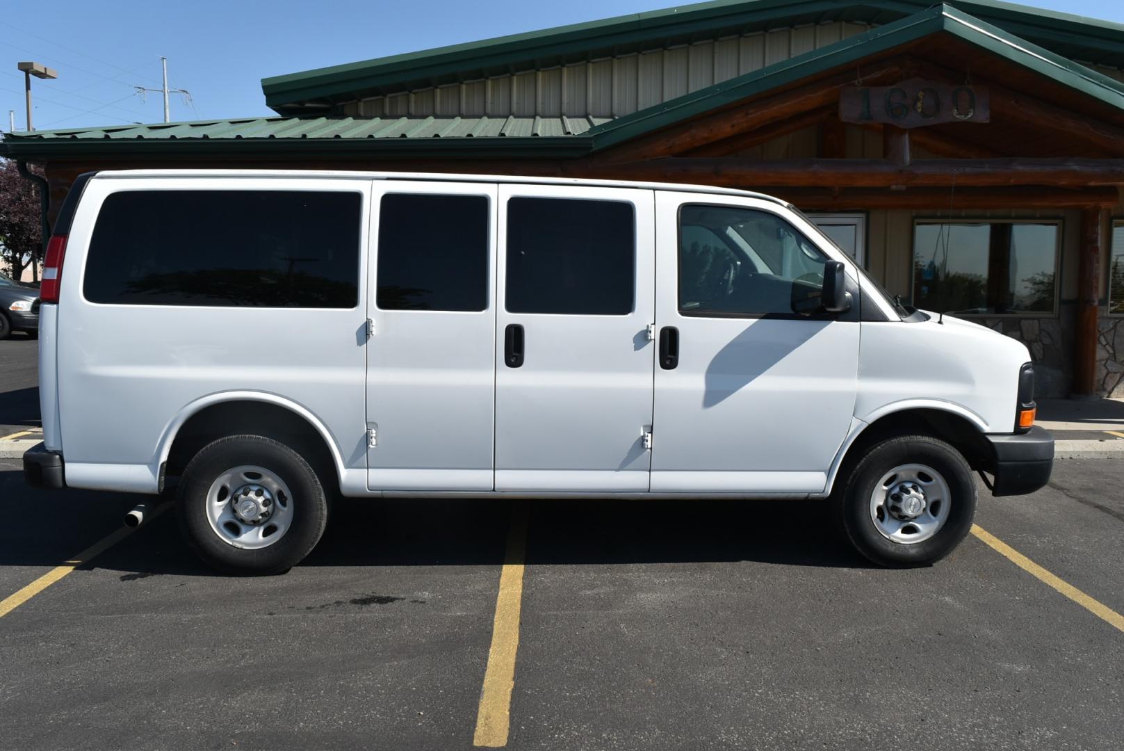 2015 White /Gray Chevrolet Express 2500 LS (1GAWGPFG7F1) with an 6.0L Vortec V-8 SFI engine, 6-Speed Automatic, Heavy-Duty, Electronically Controlled transmission, located at 1600 E Hwy 44, Rapid City, SD, 57703, (605) 716-7878, 44.070232, -103.171410 - Photo#4