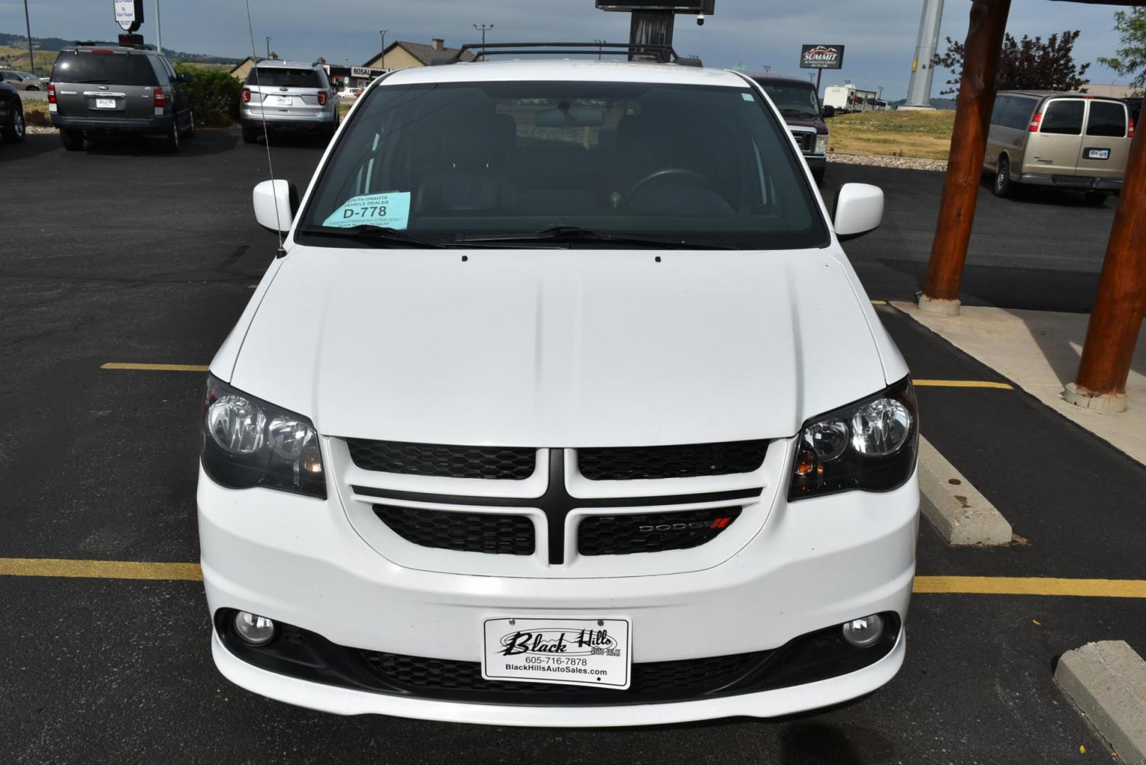 2016 White /Black Dodge Grand Caravan RT (2C4RDGEG2GR) with an 3.6L V6 24V VVT engine, 6-Speed Automatic transmission, located at 1600 E Hwy 44, Rapid City, SD, 57703, (605) 716-7878, 44.070232, -103.171410 - Photo#1