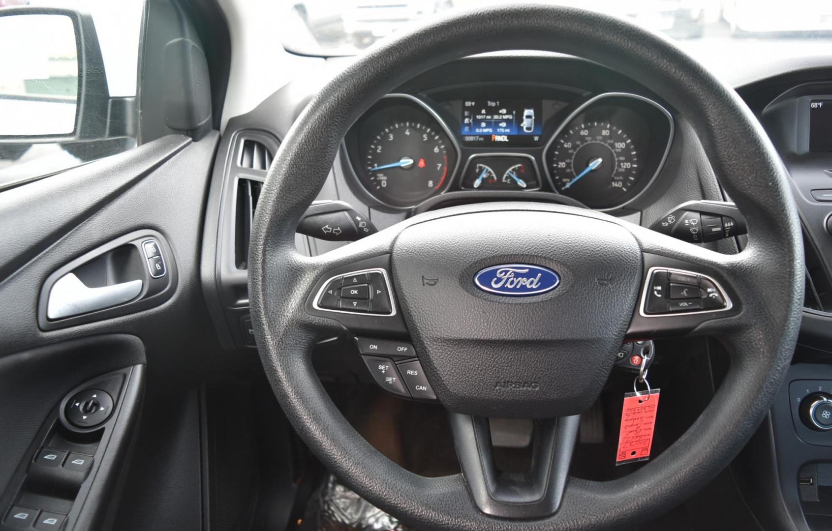 2017 White Ford Focus SE (1FADP3F26HL) with an 2.0L I-4 GDI TI-VCT engine, 6-Speed Powershift Automatic transmission, located at 1600 E Hwy 44, Rapid City, SD, 57703, (605) 716-7878, 44.070232, -103.171410 - Photo#14