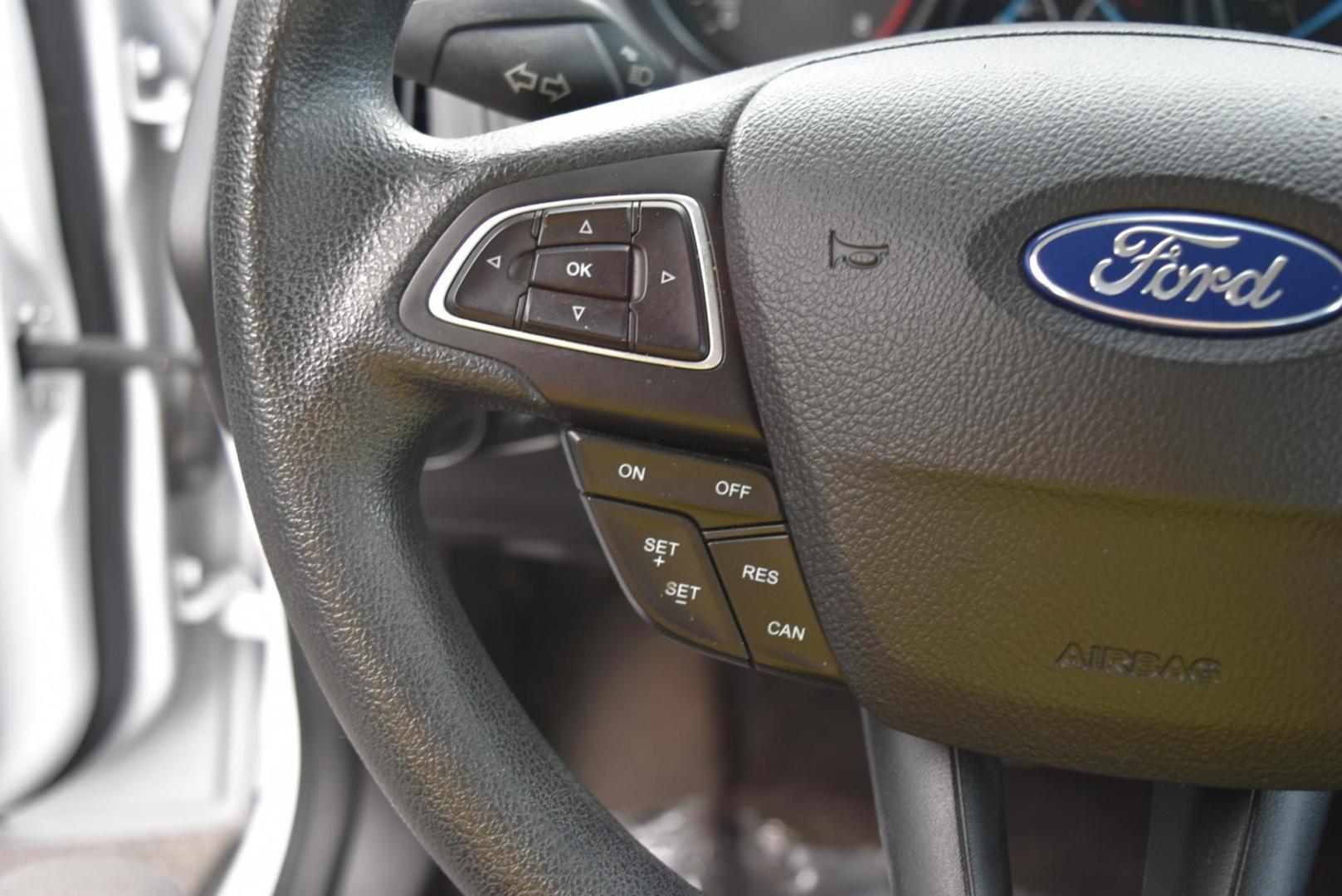 2017 White Ford Focus SE (1FADP3F26HL) with an 2.0L I-4 GDI TI-VCT engine, 6-Speed Powershift Automatic transmission, located at 1600 E Hwy 44, Rapid City, SD, 57703, (605) 716-7878, 44.070232, -103.171410 - Photo#15