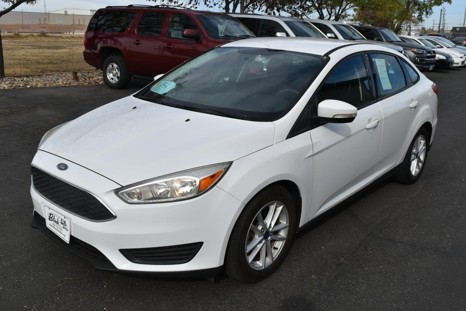 2017 White Ford Focus SE (1FADP3F26HL) with an 2.0L I-4 GDI TI-VCT engine, 6-Speed Powershift Automatic transmission, located at 1600 E Hwy 44, Rapid City, SD, 57703, (605) 716-7878, 44.070232, -103.171410 - Photo#2