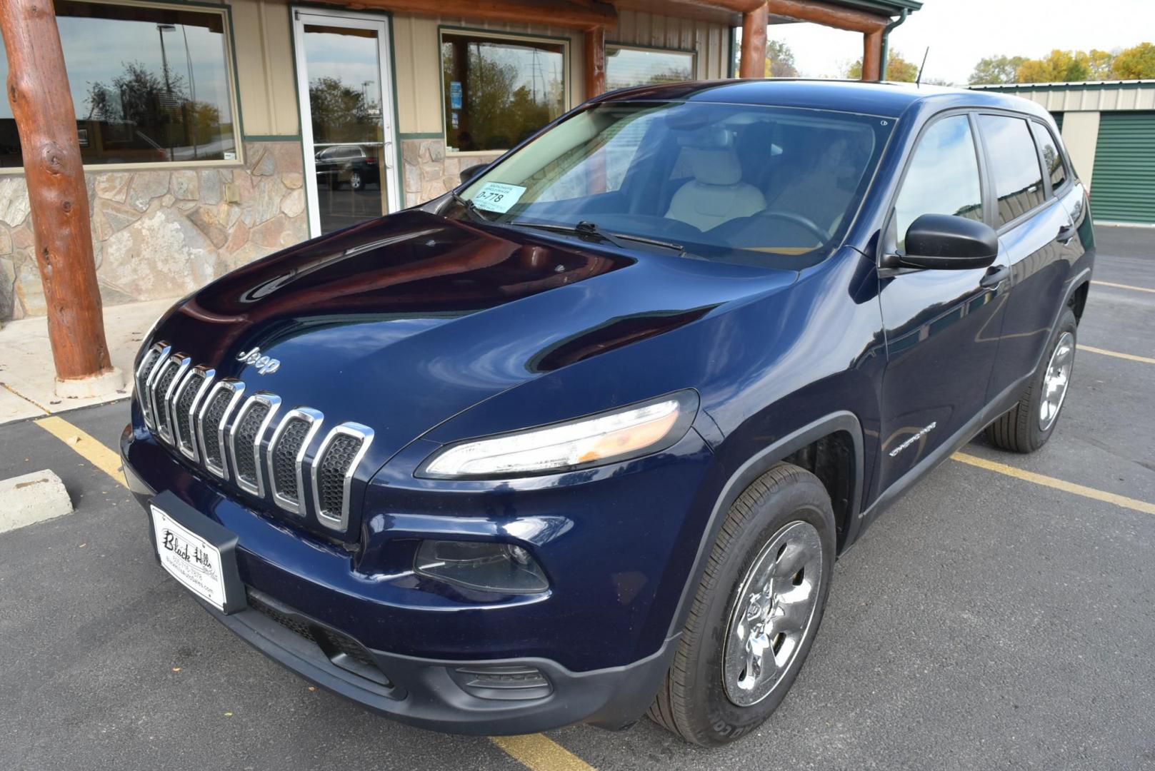 2016 Blue /Tan Jeep Cherokee Sport (1C4PJMABXGW) with an 2.4L 4 Cyl Multiair engine, 9-Speed Automatic transmission, located at 1600 E Hwy 44, Rapid City, SD, 57703, (605) 716-7878, 44.070232, -103.171410 - Photo#2