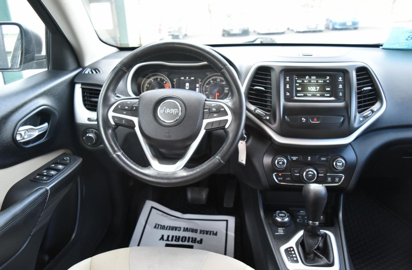 2016 Blue /Tan Jeep Cherokee Sport (1C4PJMABXGW) with an 2.4L 4 Cyl Multiair engine, 9-Speed Automatic transmission, located at 1600 E Hwy 44, Rapid City, SD, 57703, (605) 716-7878, 44.070232, -103.171410 - Photo#12