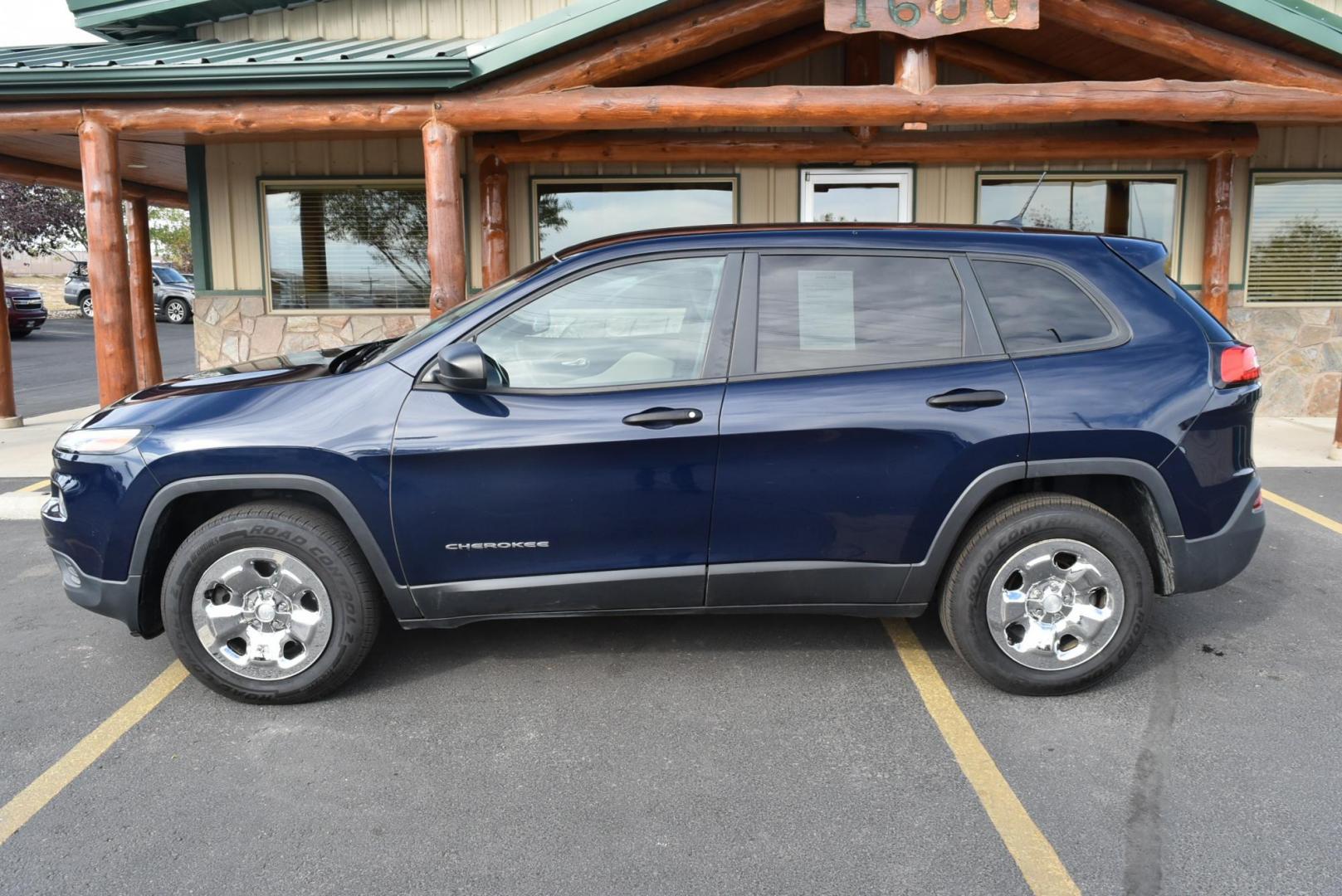 2016 Blue /Tan Jeep Cherokee Sport (1C4PJMABXGW) with an 2.4L 4 Cyl Multiair engine, 9-Speed Automatic transmission, located at 1600 E Hwy 44, Rapid City, SD, 57703, (605) 716-7878, 44.070232, -103.171410 - Photo#3