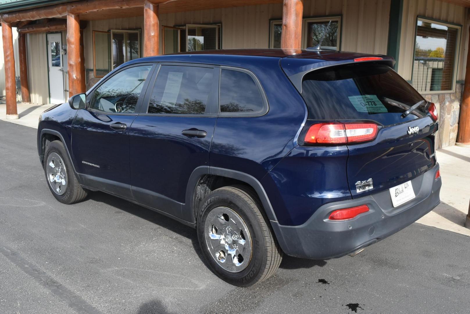 2016 Blue /Tan Jeep Cherokee Sport (1C4PJMABXGW) with an 2.4L 4 Cyl Multiair engine, 9-Speed Automatic transmission, located at 1600 E Hwy 44, Rapid City, SD, 57703, (605) 716-7878, 44.070232, -103.171410 - Photo#4