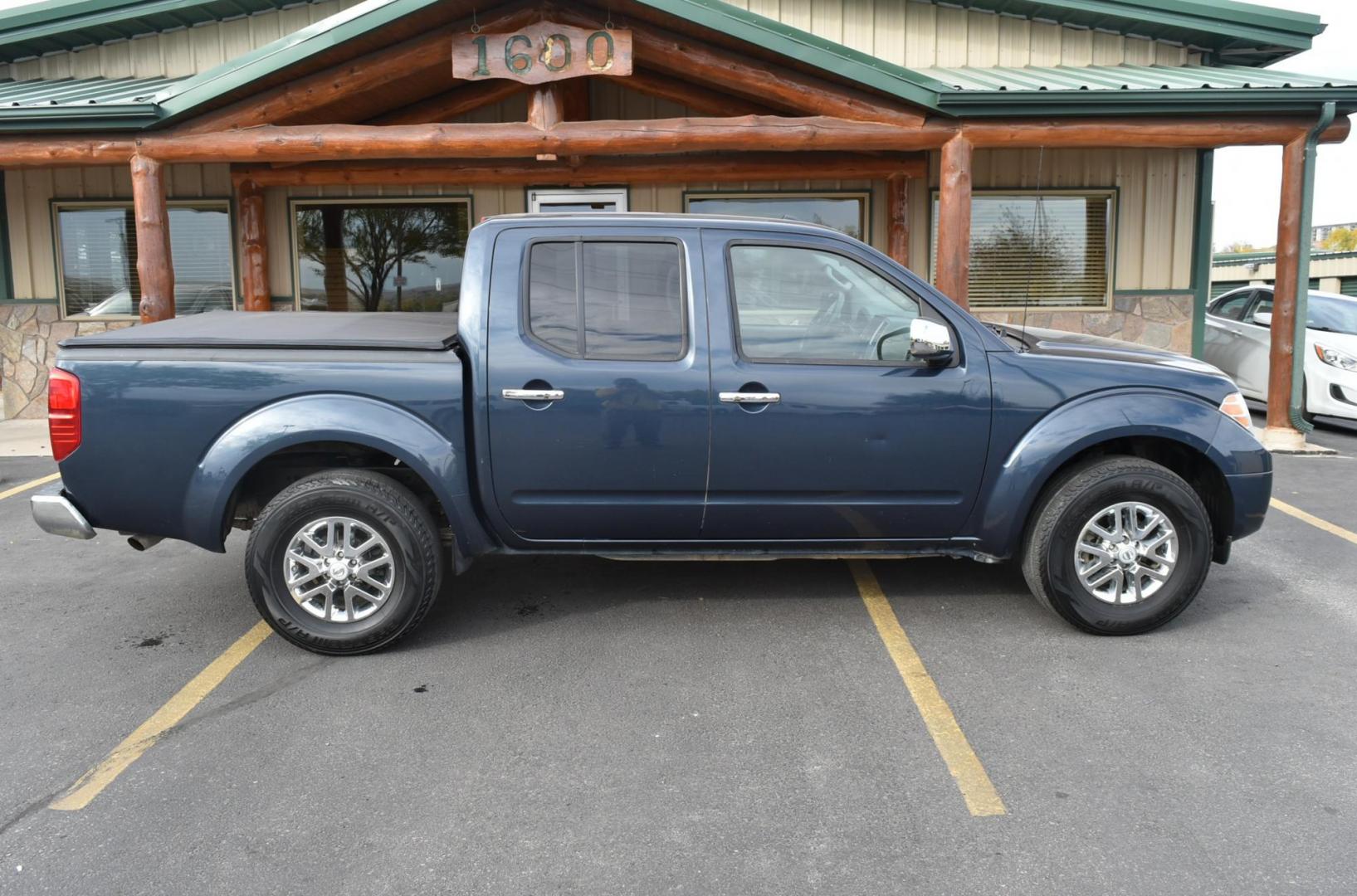 2016 Black Nissan Frontier SV (1N6AD0EV1GN) with an 4.0L v-6 engine, 5-Speed Automatic transmission, located at 1600 E Hwy 44, Rapid City, SD, 57703, (605) 716-7878, 44.070232, -103.171410 - Photo#4