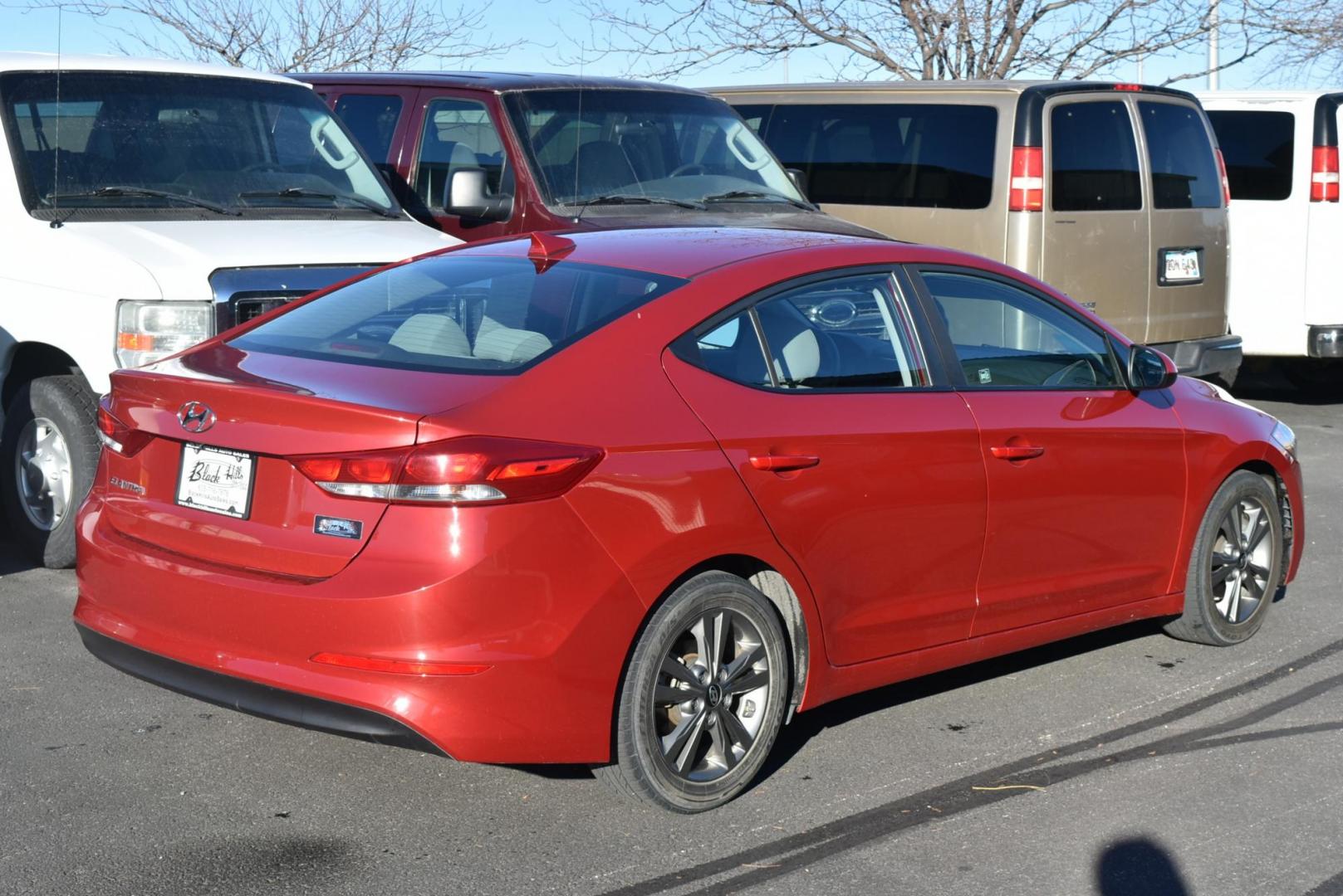 2018 Red /Gray Hyundai Elantra SEL (5NPD84LF5JH) with an 2.0L 4 Cyl engine, 6-Speed Automatic w/ OD transmission, located at 1600 E Hwy 44, Rapid City, SD, 57703, (605) 716-7878, 44.070232, -103.171410 - Photo#5