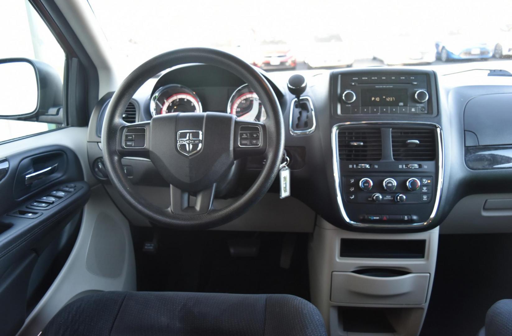 2014 Red /Black Dodge Grand Caravan SE (2C4RDGBGXER) with an 3.6L V6 VVT engine, 6-Speed Automatic transmission, located at 1600 E Hwy 44, Rapid City, SD, 57703, (605) 716-7878, 44.070232, -103.171410 - Photo#14