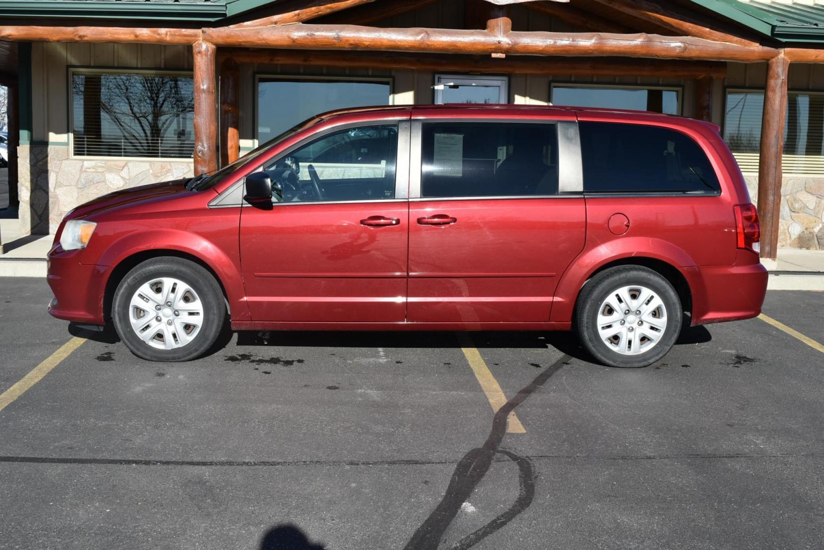 2014 Red /Black Dodge Grand Caravan SE (2C4RDGBGXER) with an 3.6L V6 VVT engine, 6-Speed Automatic transmission, located at 1600 E Hwy 44, Rapid City, SD, 57703, (605) 716-7878, 44.070232, -103.171410 - Photo#3