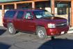 2009 Maroon /Tan Chevrolet Suburban LT (1GNFK26339J) with an 5.3L Vortec V8 SFI with Active Fuel Management engine, 6-Speed Automatic transmission, located at 1600 E Hwy 44, Rapid City, SD, 57703, (605) 716-7878, 44.070232, -103.171410 - Photo#0